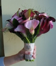 Mixed calla posy with diamantes and fountain grass